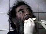 Теперь Саддам совсем не напоминает того подавленного и запуганного человека, который был извлечен американскими солдатами несколько дней назад из подземного погреба недалеко от Тикрита