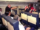 В США нетрезвая авиапассажирка избила "воздушого маршала" В США нетрезвая авиапассажирка избила "воздушого маршала"