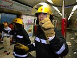 Пожар произошел в тот момент, когда поезд прибыл на станцию "Адмиралти" - самую загруженную развязку гонконгского метрополитена. Как утверждают очевидцы, один из вагонов был окутан дымом