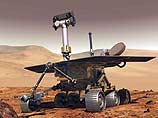 Марсоход Spirit, находящийся на дне кратера Гусева на Марсе, выполнил с помощью микрокамеры, размещенной на его механической руке-манипуляторе, первое фотографирование маленького участка марсианского грунта