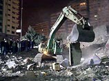 По последним данным, 14 человек погибли, 42 получили ранения в результате обрушения 12-этажного здания в каирском районе Наср-Сити По последним данным, 14 человек погибли, 42 получили ранения в результате обрушения 12-этажного здания в каирском районе Наср-Сити