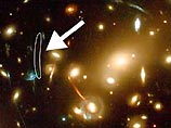 Международной команде ученых с помощью космического телескопа Hubble удалось сфотографировать самый отдаленный от земли объект - новую галактику, находящуюся на расстоянии 13 млрд световых лет от Земли