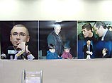 Арест Ходорковского правительственными чиновниками был расценен как "причина для паузы" теми, кто еще только собирается инвестировать в Россию