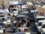 Этот марш поддержки осажденного города был организован по призыву суннитских и шиитских духовных лидеров