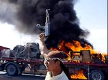 Под Багдадом боевики уничтожили конвой США: 9 американцев погибли Под Багдадом боевики уничтожили конвой США: 9 американцев погибли
