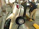 В Чили пенсионер припарковался сразу на двух этажах гаража В Чили пенсионер припарковался сразу на двух этажах гаража