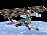 Экипаж 9-й космической экспедиции открыл люки "Союза" и "переплыл" к праздничному столу на МКС Экипаж 9-й космической экспедиции открыл люки "Союза" и "переплыл" к праздничному столу на МКС