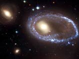 К  14-летию запуска телескопа Hubble  NASA опубликовала снимок столкновения галактик  (ФОТО)