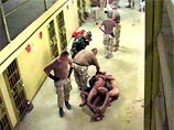 Газета The Washington Post опубликовала в четверг новые снимки издевательств над иракскими заключенными в тюрьме "Абу-Грейб" под Багдадом