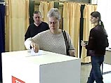В 7 часов утра по местному времени (08:00 мск) в Литве сегодня открылись двери всех 2039 избирательных участков по повторным досрочным выборам главы государства