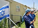 Как сообщает ИА "Курсор" со ссылкой на газету Ha'aretz, за последние два месяца в поселение Нецарим, расположенное внутри палестинского анклава, на постоянное местожительство прибыло шесть семей