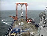 В норвежском городе Тронхейм сейчас идет погрузка глубоководного аппарата на судно, которое тут же возьмет курс на Баренцево море
