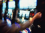 В Москве, где сконцентрированы огромные деньги, полученные от продажи нефти, природного газа и других сырьевых ресурсов, жизнь в игорных заведениях бьет ключом В Москве, где сконцентрированы огромные деньги, полученные от продажи нефти, природного газа и других сырьевых ресурсов, жизнь в игорных заведениях бьет ключом
