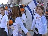 "Живая цепь" противников эвакуации еврейских поселений протянулась от блока поселений Гуш-Катиф в секторе Газа до Стены плача в Иерусалиме "Живая цепь" противников эвакуации еврейских поселений протянулась от блока поселений Гуш-Катиф в секторе Газа до Стены плача в Иерусалиме