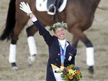 Голландская всадница Анки ван Грюнсвен стала двукратной олимпийской чемпионкой по выездке