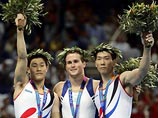 В ходе выступления гимнастов 18 августа судьи допустили ошибки, которые помешали занявшему третье место Янг Тэ Йону (на фото справа) опередить соотечественника Ким Дэ Ына и Хамма и стать олимпийским чемпионом