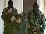 "Обвиняемым Кулаевым он опознан под номером 12", - сказал Колесников, показав фото убитого террориста