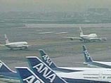 В аэропорту Токио загорелся самолет: объявлена тревога