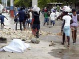 В среду на Гаити начали хоронить жертв тропического урагана "Жанна", унесшего, по последним данным, жизни более 700 человек