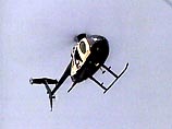 Программа НТВ "Криминал" показала уникальные кадры, снятые с вертолета во время полицейской операции в одном из районов мексиканской столицы.