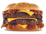 Американское пристрастие к высококалорийному фаст-фуду приняло новые ужасные масштабы, облекшись в форму самого огромного и калорийного гамбургера, когда-либо появлявшегося в стране, которая и так страдает от ожирения