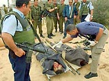 С обвинениями в адрес Израиля глава палестинского правительства выступил вскоре после убийства израильскими войсками высокопоставленного деятеля группировки "Исламский джихад" в районе города Дженин на Западном берегу реки Иордан
