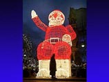 ''Великий и ужасный''. Фантомный образ Санта-Клауса обесценивает смысл Рождества. Берлин, площадь перед Кайзер-Вильгельм-кирхе