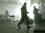 Иракская вооруженная группировка "Армия Ансар ас-Сунна" разместила в воскресенье на одном из своих интернет-сайтов видеозапись взрыва на американской военной базе Мосула, унесшего жизни 26 человек