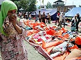 Общее число погибших и пропавших без вести в результате цунами приблизилось к 234 тысячам человек Общее число погибших и пропавших без вести в результате цунами приблизилось к 234 тысячам человек