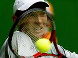 В третьем круге Australian Open Николай Давыденко обыграл Тима Хенмэна 