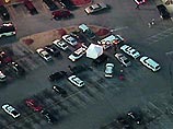 Сотрудники полиции арестовали 24-летнего мужчину, открывшего в воскресенье стрельбу в многолюдном торговом центре американского города Кингстон