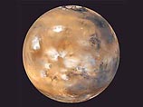 Анализ фотографий с европейской станции Mars Express показал, что в пяти градусах широты севернее экватора поверхность планеты имеет странную фактуру Анализ фотографий с европейской станции Mars Express показал, что в пяти градусах широты севернее экватора поверхность планеты имеет странную фактуру