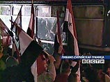 В ночь с пятницы на субботу колонна из нескольких десятков автобусов и джипов с сирийскими солдатами и офицерами, грузовиков с оружием, укрытым под брезентом, и тягачей с бронетехникой пересекли ливанcко-сирийскую границу В ночь с пятницы на субботу колонна из нескольких десятков автобусов и джипов с сирийскими солдатами и офицерами, грузовиков с оружием, укрытым под брезентом, и тягачей с бронетехникой пересекли ливанcко-сирийскую границу