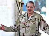 Джордж Буш разжаловал бригадного генерала резерва сухопутных войск США Джанис Карпински в полковники за ее роль в скандале вокруг жестокого обращения американских военнослужащих с заключенными тюрьмы "Абу-Грейб" в Ираке