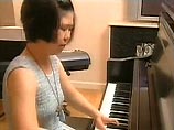  Ли Хи Ах - первая в мире профессиональная пианистка с подобными физическими недостатками