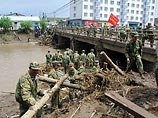 Жители китайского поселка Шалань, накрытого селем, уверены, что власти скрывают число погибших Жители китайского поселка Шалань, накрытого селем, уверены, что власти скрывают число погибших