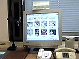 были изъяты десятки компьютеров, компакт-диски и видеокассеты с порнографией