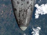 Астронавты Discovery вышли в открытый космос Астронавты Discovery вышли в открытый космос