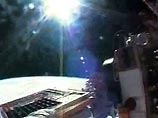 Астронавты с МКС вышли в открытый космос и отремонтировали обшивку Discovery