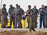 Останки 48 израильтян, похороненных на территории еврейских поселений в секторе Газа, будут сегодня эксгумированы и погребены на территории Израиля