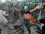 На  военном параде "Хамас" в секторе Газа взорвался автомобиль:  10 палестинцев погибли 