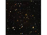 Ученые впервые заметили галактику по кодовым названием HUDF-JD2 на инфракрасных снимкам, сделанных в прошлом году телескопом Hubble. Дальнейшие ее наблюдения проводились при помощи телескопа NASA Spitzer, а также одного из европейских телескопов