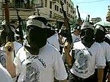 В Палестинской автономии полицейские ворвались в парламент, стреляя в воздух В Палестинской автономии полицейские ворвались в парламент, стреляя в воздух