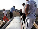 Ураган "Катрина" поднял трупы из могил в Луизиане (ФОТО)
Ураган "Катрина" поднял трупы из могил в Луизиане (ФОТО)