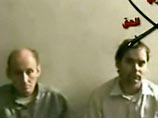 Al-Jazeera показала видеозапись с четырьмя похищенными в Ираке иностранцами  