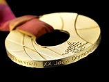 Олимпийские медали Турина будут иметь форму кольца