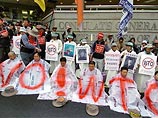 В Гонконге полиция применила водяные пушки против крестьян-антиглобалистов В Гонконге полиция применила водяные пушки против крестьян-антиглобалистов