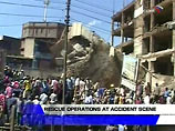 По меньшей мере, шесть человек, по данным Красного Креста Кении, погибли под развалинами пятиэтажного дома, рухнувшего в понедельник в старом квартале столицы государства Найроби