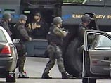 В Фениксе на 18-м этаже небоскреба захвачены в заложники девять человек В Фениксе на 18-м этаже небоскреба захвачены в заложники девять человек