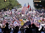 Массовые акции протеста против нежелания американских законодателей быстро одобрить законопроект об иммиграции, касающийся пребывания в стране нелегальных иммигрантов, прошли в воскресенье во многих городах США